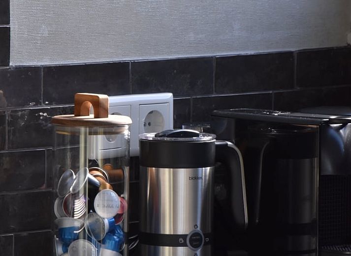 Gemuetlicher Wohnraum im Ferienhaus in Lunteren mit Blick auf die Veluwe, Gelderland.