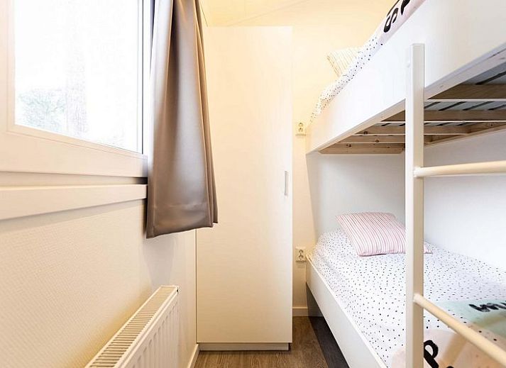 Geniet van de zon op het terras van Module 6 personen in Lunteren, Veluwe, Gelderland, een ruim vakantiehuis.