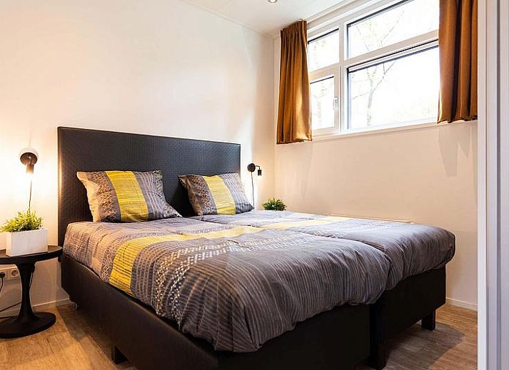 Spezielles Modul-Ferienhaus fuer 5 Personen in Lunteren, Veluwe, Gelderland, mit moderner Einrichtung und gruener Umgebung.