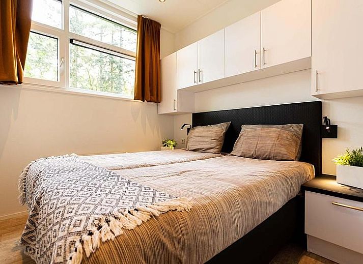 Spezielles Modul-Ferienhaus fuer 5 Personen in Lunteren, Veluwe, Gelderland, mit moderner Einrichtung und gruener Umgebung.