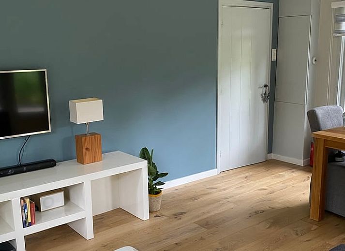 Gezellig vakantiehuisje in Lunteren, Veluwe, omgeven door groen en rust.