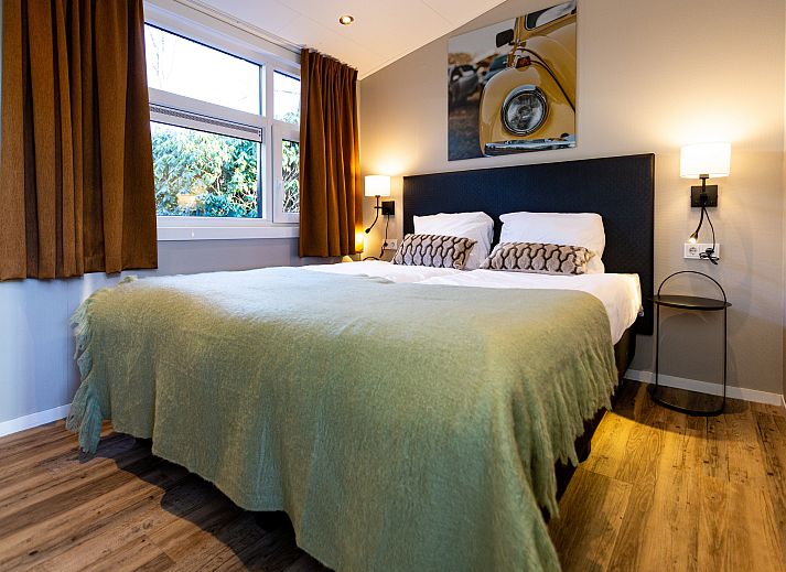 Boslodge Silva in Lunteren, Veluwe, Ferienhaus umgeben von grner Natur.