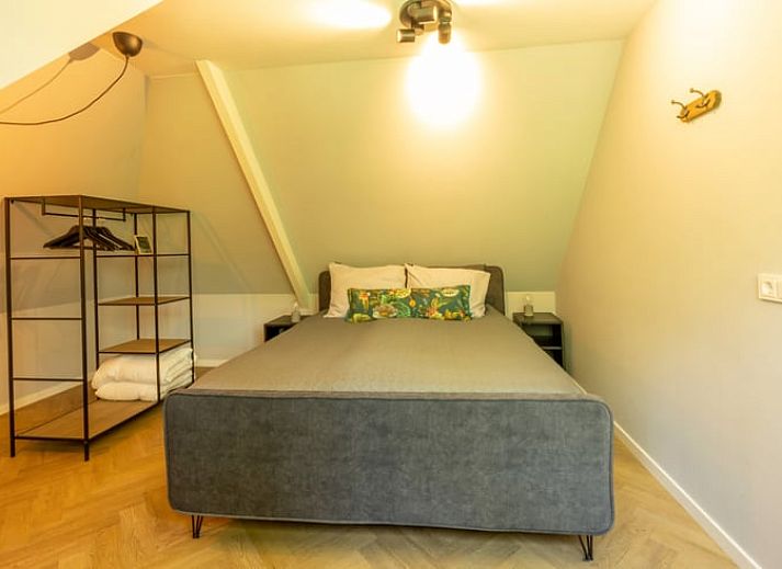 Comfortabele zithoek in Vakantiehuis in Lunteren, Veluwe, Gelderland met veel daglicht.