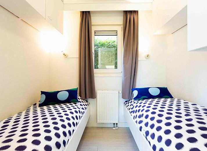 Ferienhaus fuer 4 Personen in Lunteren, Veluwe, Gelderland mit gemuetlicher Terrasse und Garten fuer entspanntes Wohnen im Freien.