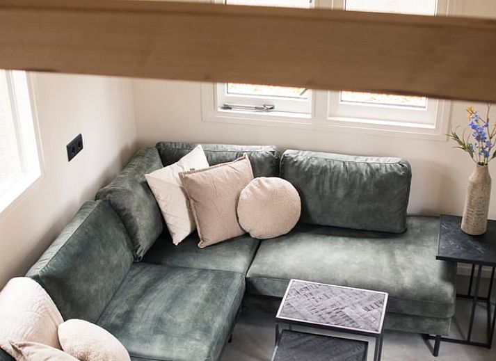 Rustiek vakantiehuisje in Uddel, Veluwe, met moderne voorzieningen en omgeven door bosrijke natuur.