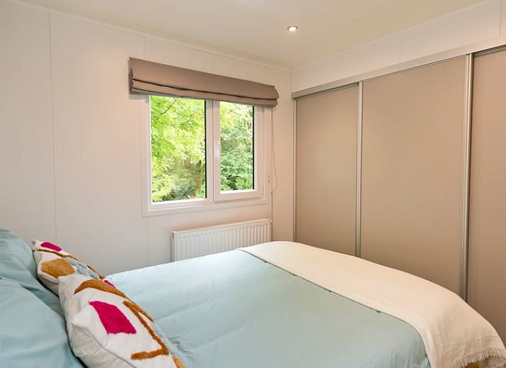 Ontspannende hangstoel in de tuin van Vakantiehuis in Rheden, Veluwe, Gelderland.