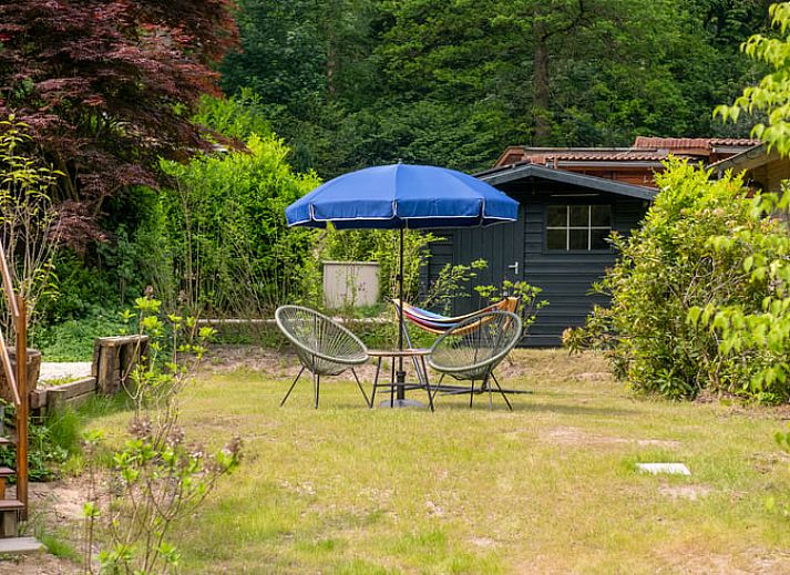 Sfeervolle slaapkamer in Vakantiehuisje in Rheden, Veluwe, Gelderland met moderne inrichting.