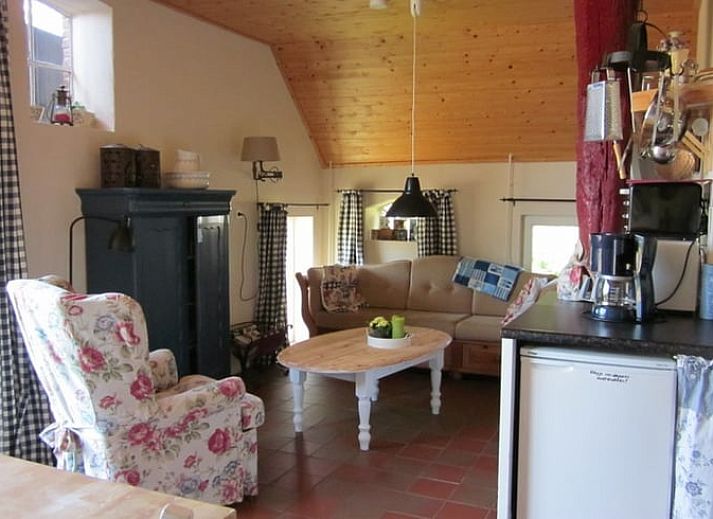 Cottage in Heerde, Veluwe vacation home surrounded by flowering trees in Gelderland.