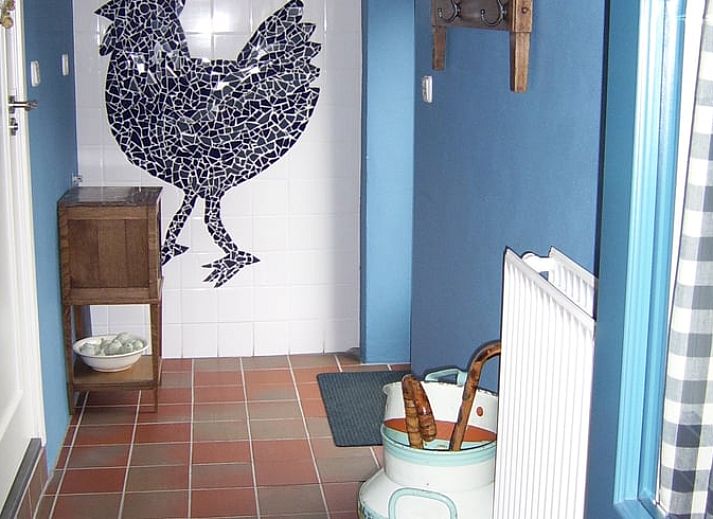 Shaded porch at cottage in Heerde, Veluwe vacation home in Gelderland.