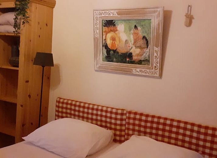 Shaded porch at cottage in Heerde, Veluwe vacation home in Gelderland.