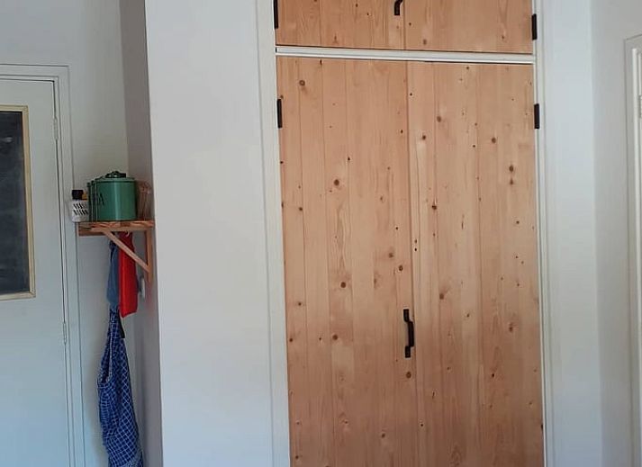 Spring flowers adorn the garden at Cottage in Heerde, Veluwe vacation home in Gelderland.