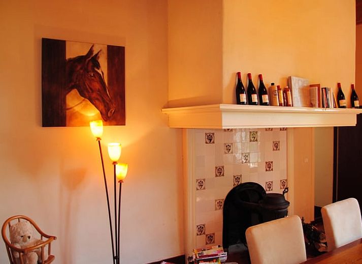 Charming terrace at cottage in Heerde, Veluwe, surrounded by flowering shrubs in Gelderland.