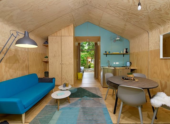 Ferienhaus in Apeldoorn, umgeben von der Veluwe-Natur, gemuetliche Terrasse zur Entspannung.