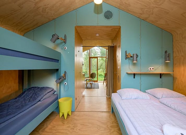 Ferienhaus in Apeldoorn, umgeben von der Veluwe-Natur, gemuetliche Terrasse zur Entspannung.