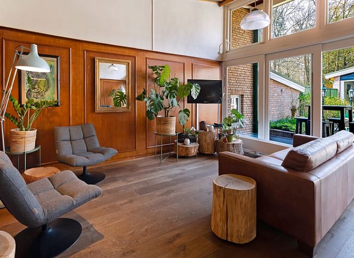 Charmantes Ferienhaus in Apeldoorn mit Blick auf die gruenen Waelder der Veluwe.