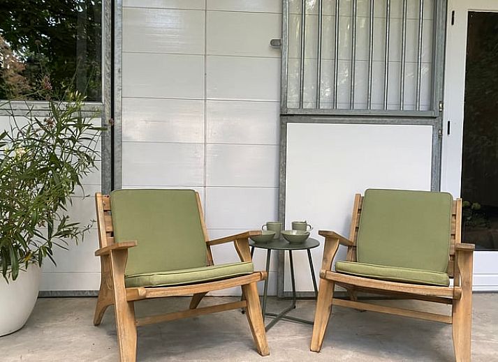 Cozy terrace at Cottage in Hattem, vacation accommodation in the Veluwe, Gelderland.