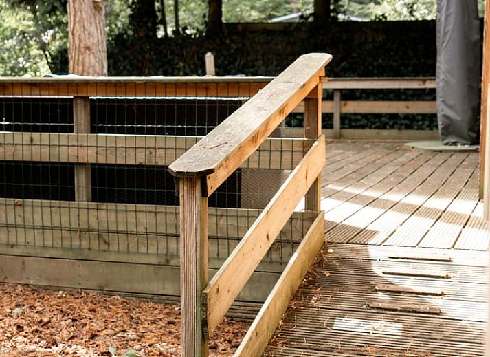 Cozy porch at Holiday home in Doornspijk, Veluwe, Gelderland surrounded by nature.