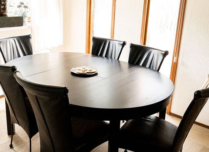Comfortable seating area on the terrace of Holiday Home in Doornspijk, Veluwe, Gelderland.
