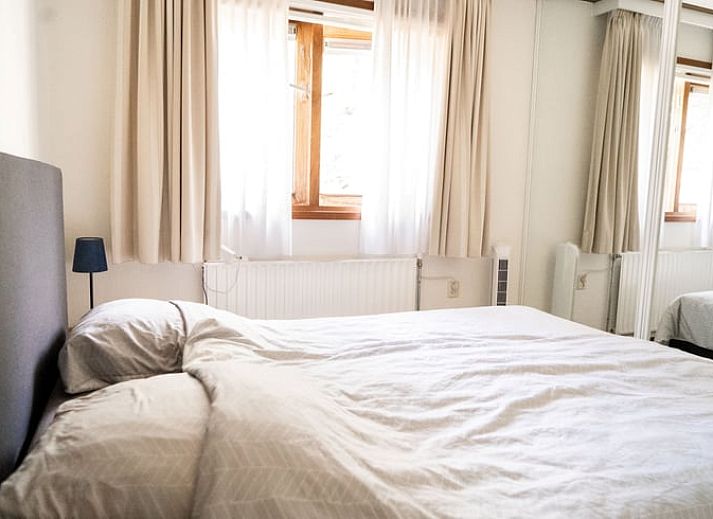 Comfortable seating area on the terrace of Holiday Home in Doornspijk, Veluwe, Gelderland.