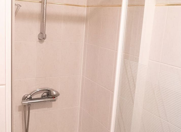 Relaxing chairs in the garden of Holiday home in Doornspijk, Veluwe, Gelderland for ultimate comfort.