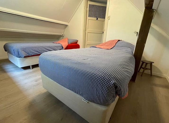 Authentisches Ferienhaus in Wapenveld, Veluwe, Gelderland mit stimmungsvollen Holzakzenten.