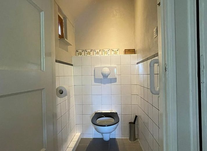 Authentisches Ferienhaus in Wapenveld, Veluwe, Gelderland mit stimmungsvollen Holzakzenten.