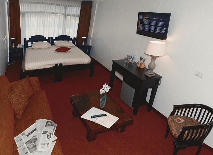 Comfortabele slaapkamer in Hotel Den Helder, ideaal vakantie appartement aan de Noordzeekust, Noord-Holland.