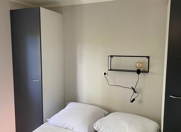 Vakantiehuisje in Lieren met ruime tuin en zitgedeelte, ideaal voor ontspanning op de Veluwe.