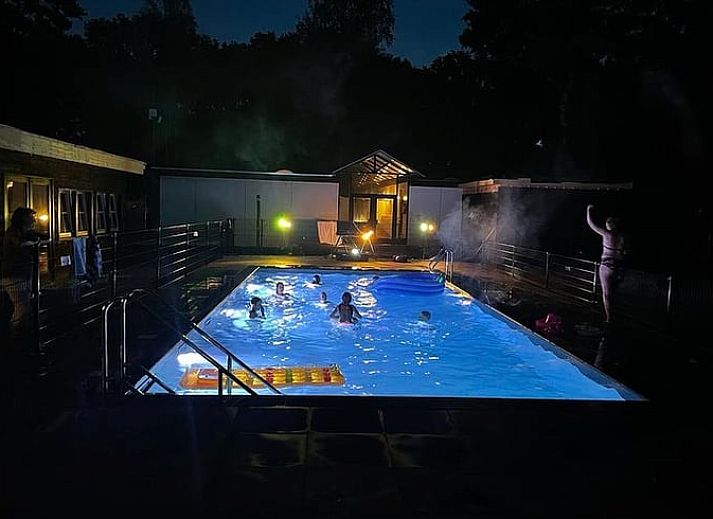 Vakantiehuisje in Lieren met ruime tuin en zitgedeelte, ideaal voor ontspanning op de Veluwe.