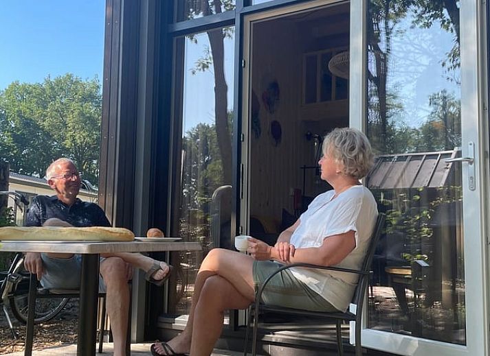 Ferienhaus in Lieren, umgeben von gruener Natur in der Veluwe, Gelderland.
