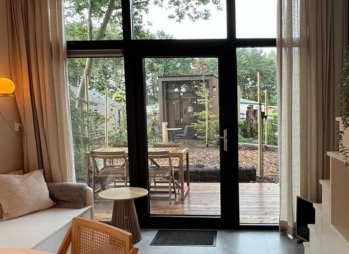 Wooden terrace at Holiday home in Lieren, surrounded by Veluwe forests.