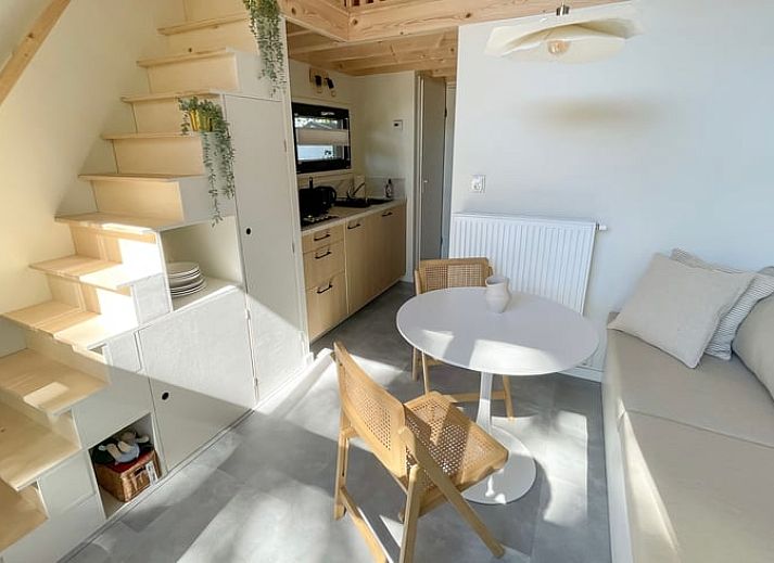 Wooden terrace at Holiday home in Lieren, surrounded by Veluwe forests.