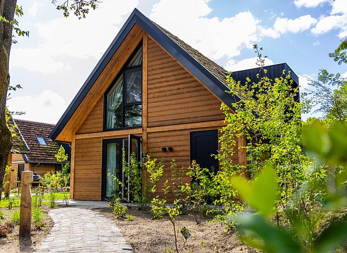 Charmante Waldvilla mit Whirlpool & Sauna in Wekerom, Veluwe, Gelderland. Perfektes Ferienhaus fuer sechs Personen inmitten der Natur.