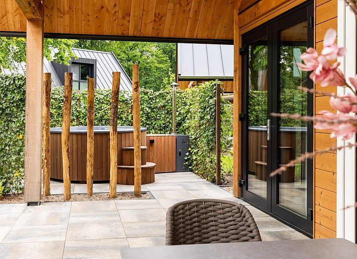 Charmante Waldvilla mit Whirlpool & Sauna in Wekerom, Veluwe, Gelderland. Perfektes Ferienhaus fuer sechs Personen inmitten der Natur.