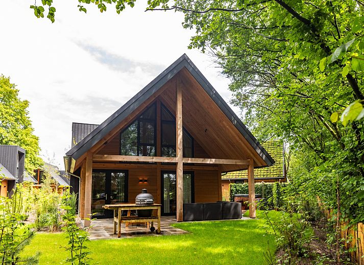 Charmante Waldvilla mit Whirlpool & Sauna in Wekerom, Veluwe, Gelderland. Perfektes Ferienhaus fuer sechs Personen inmitten der Natur.