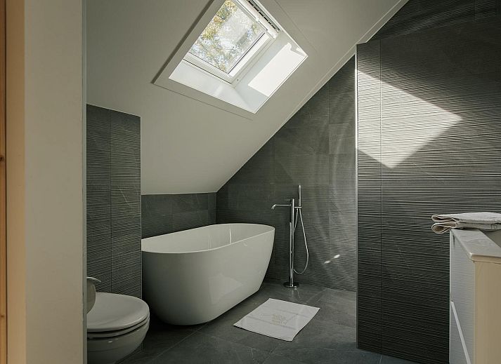 Buitenkeuken bij Heide Villa in Wekerom, Veluwe, ideaal voor zomeravonden.