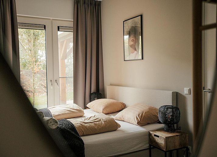 Buitenkeuken bij Heide Villa in Wekerom, Veluwe, ideaal voor zomeravonden.