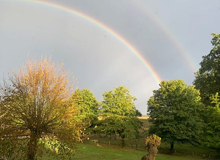 Gemuetliche Sitzecke mit Kamin im Ferienhaus Hoog Soeren, Veluwe.