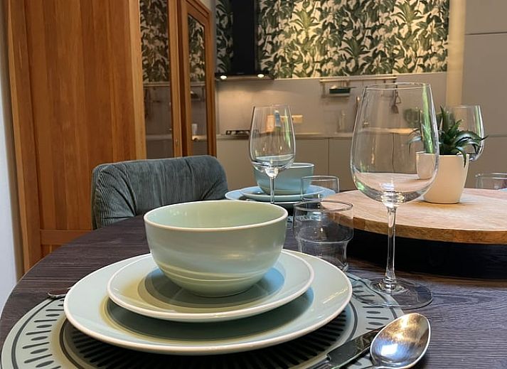 Gezellige binnenruimte van Huisje in Bennekom, vakantiehuis op de Veluwe, Gelderland. Geniet van comfort en natuur in een serene omgeving.