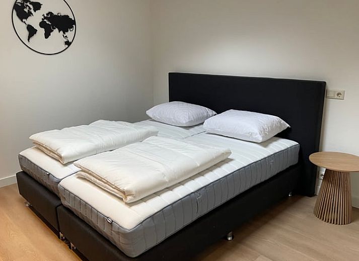 Ontspan in de luxe hot tub bij Huisje in Bennekom, een vakantiehuis op de Veluwe in Gelderland, omgeven door natuurlijke schoonheid.