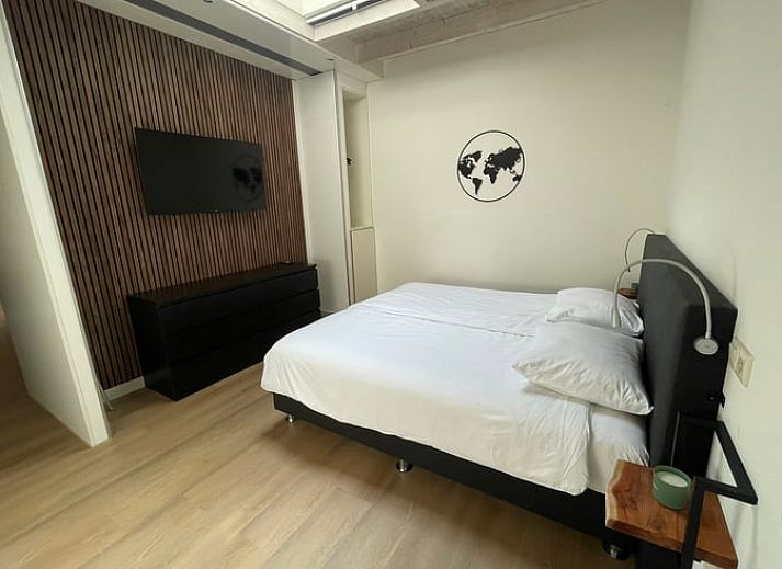 Ontspan in de luxe hot tub bij Huisje in Bennekom, een vakantiehuis op de Veluwe in Gelderland, omgeven door natuurlijke schoonheid.