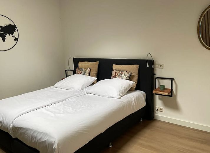 Ontspan in de luxe hot tub bij Huisje in Bennekom, een vakantiehuis op de Veluwe in Gelderland, omgeven door natuurlijke schoonheid.