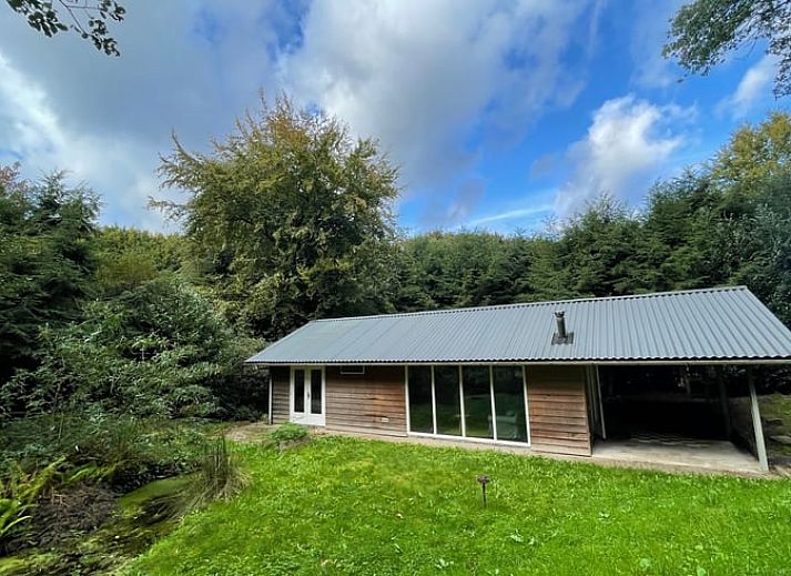 Moderne vakantiehuis Huisje in Bennekom op de Veluwe met ruime veranda en groene omgeving in Gelderland.