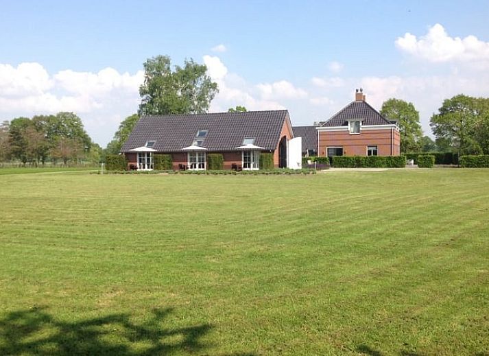 Vakantiehuisje in Eerbeek biedt een prachtig uitzicht op de Veluwse natuur, gelegen in het groene landschap van Gelderland.