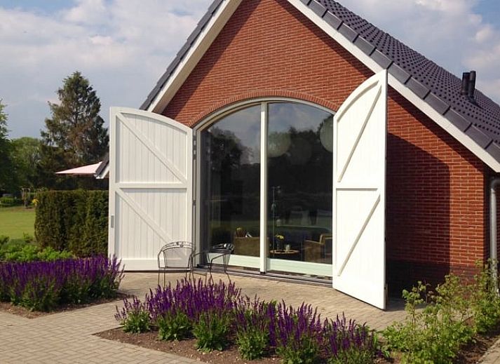 Vakantiehuisje in Eerbeek biedt een prachtig uitzicht op de Veluwse natuur, gelegen in het groene landschap van Gelderland.