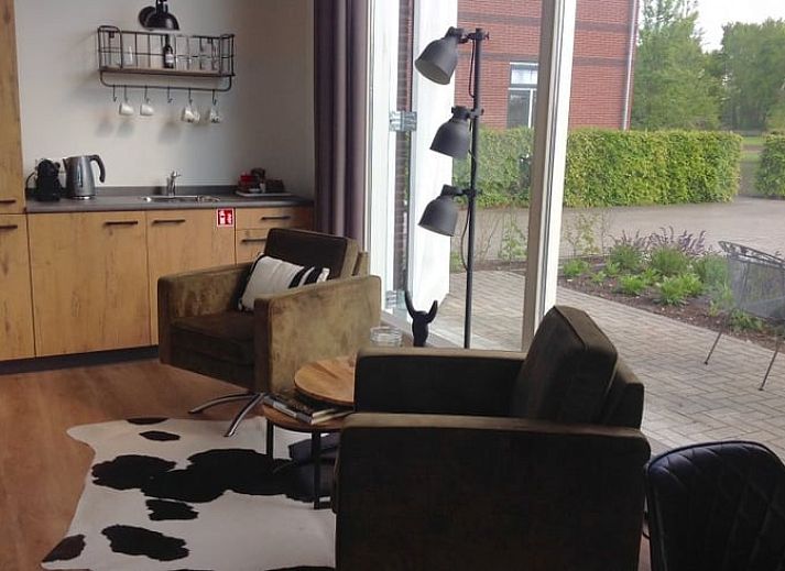 Vakantiehuisje in Eerbeek op de Veluwe, Gelderland, omgeven door groene natuur en rustieke charme.