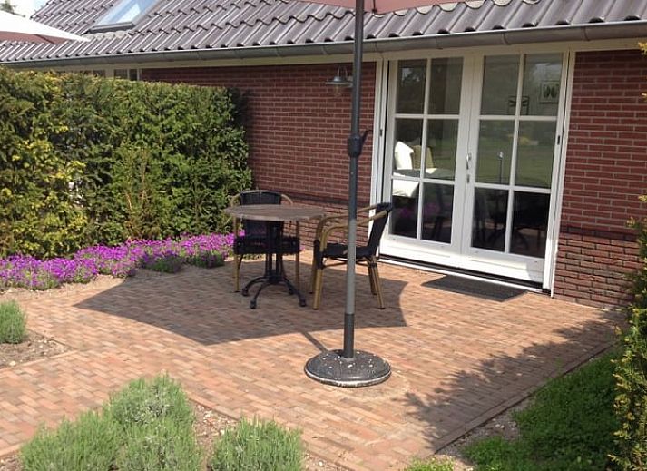 Vakantiehuisje in Eerbeek op de Veluwe, Gelderland, omgeven door groene natuur en rustieke charme.