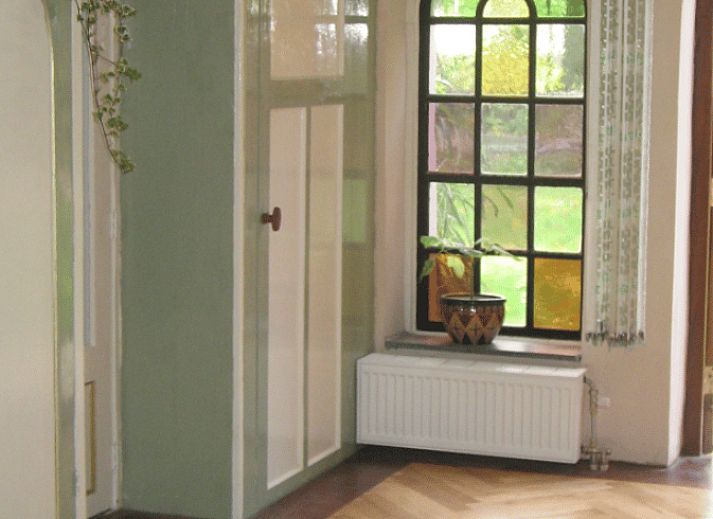 Charming vacation home in Wenum Wiesel in the Veluwe, Gelderland, surrounded by autumn nature.