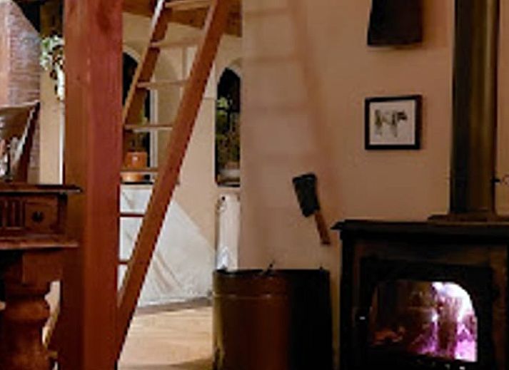Spacious dining room with wooden interior in Holiday home in Wenum Wiesel, Veluwe, Gelderland.