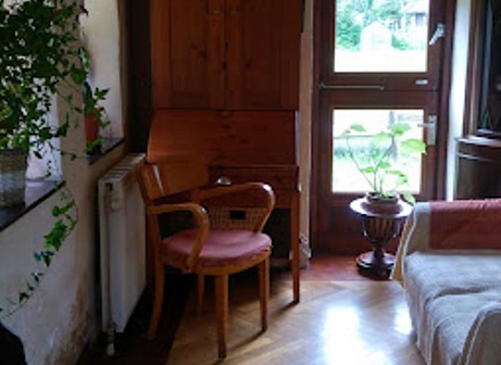 Spacious dining room with wooden interior in Holiday home in Wenum Wiesel, Veluwe, Gelderland.